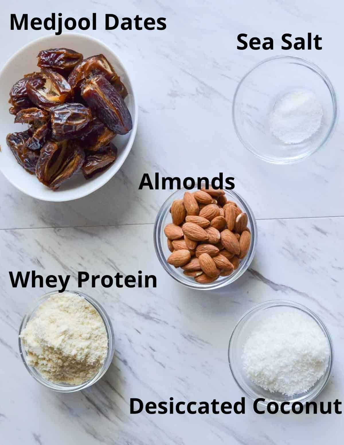 ingredients listed to make salted caramel protein bliss balls.