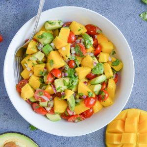overhead click of summer salad made with mango and avocado
